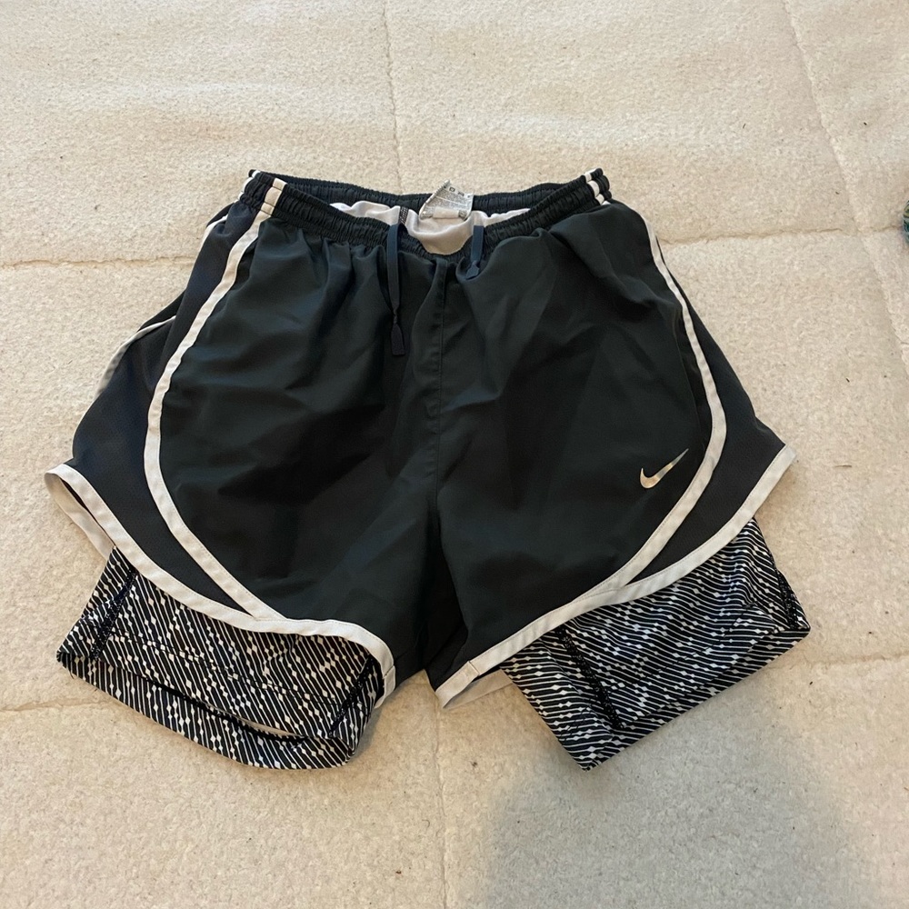 Grey Nike shorts with attached spandex inside
